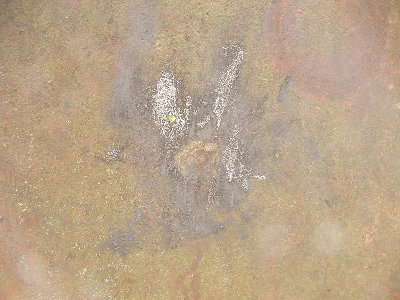 The impact did leave a small mark of the battery electrode on the steel plate.