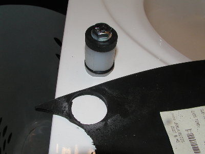 A proper size seal is cut from a sheet of rubber using a hole saw.  It is cut slightly large and then the edges are trimmed on the drill press to size just like the way the piston is made.