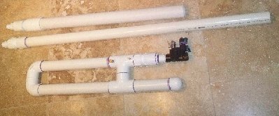 The cannon, alongside the two barrels. The longer barrel is 2&amp;quot;x55&amp;quot; for golf balls, and the shorter barrel is 2.5&amp;quot; x 36&amp;quot; for tennis balls