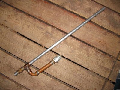 the actual gun, the barrel with ports is epoxied into the T.