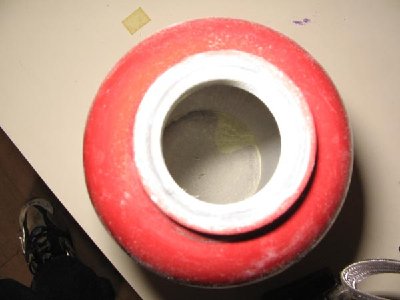 This is the chamber with some of the powder remaining, it is sealed to the top peice with and o ring.