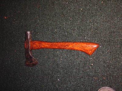 Not to throw this off topic, but here's what I used to cut down the hickory tree... might be of interest(I'll move it to the knife thread if necessary).