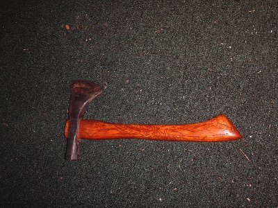 Head is hand-forged from some 1.125&amp;quot; round stock, but it didn't hold and edge to my liking so I welded on some file-steel.<br />Handle is white oak.<br /><br />The wood burning was done with a soldering iron.