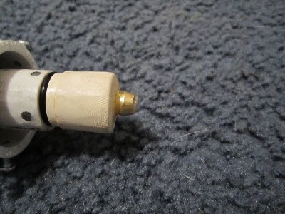 The rear plug. This is some kind of CPVC transition adapter. For what, I don't know, all I know is that it had an end that fit inside 1/2&amp;quot; SCH-40 and a 1/2&amp;quot; CPVC spigot end, and an o-ring. I installed it with #6-32 decapitated machine screws, with moderate compression on the o-ring, with a 1/2&amp;quot; CPVC cap on back. The brass olive is lending some security to the 1/4&amp;quot; fill hose epoxied through the cap.