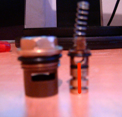 pilot valve - the red line shows the hole in the center