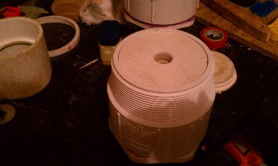 This is the Rear Cap with Wood puck fillings to reduce the pilot area with a 1/2&amp;quot; - 3/4&amp;quot; hold drilled in them. Epoxied to the rear cap