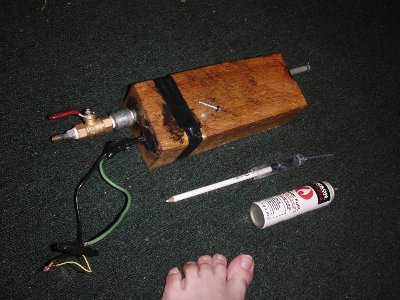Fueling is(was) with a homemade syringe. A small hole was drilled in the side and plugged with a bolt/oring.