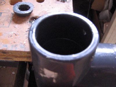 The set up goes in the back of this T