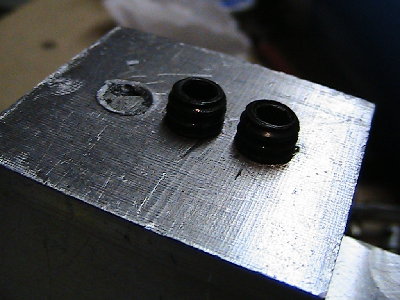 barrel screws. the ugly spot is from braking a tap and then grinding it down