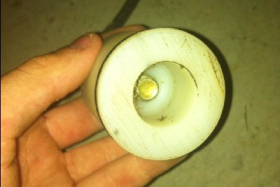 Back of piston bored out to save weight