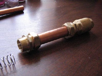 This is the piston housing and exhaust, I am using a one way valve for the exhaust. This means I can make a hammer to trigger the one way valve.