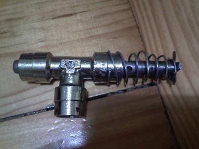 find/make a suitable spring and check for leaks