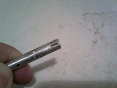 find a 6mm OD tube, brass/aluminum/steel<br />polish it nicely and drill 4 exhaust ports, 3mm ID max and cut 4 gaps, about 4mm deep