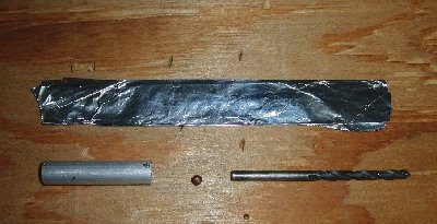 1) fold the foil until you have a strip 4 to 5 times the diameter of your projectile.