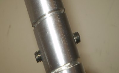 Grub screws, there long because there going through an aluminium action block aswell.