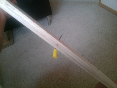 3/4" birch plywood at about 20 ft.  Even with the extra strong steel nails, at this distance, they get a beat down.