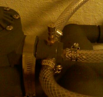 The shrader valve between the pilot and the main valves to get them to closewhen filling.