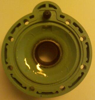 I inserted a three-quarter inch threaded fitting and filled as much of the pilot space with epoxy as I could. Because you have to remove the stop for the diaphragm you can adjust how much the diaphragm opens by adjusting how far you insert the three quarter inch fitting, because the three quarter inch fitting now acts as a stop.