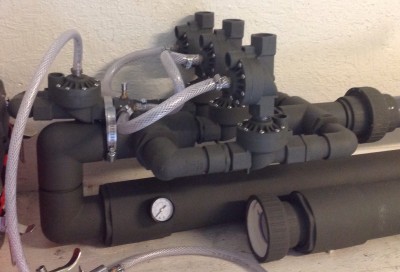 Three 1" Orbits sprinkler valves, piloted by three 3/4" Orbits, piloted by a single 3/4" valve.