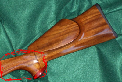 the red shows the grain direction, how it should flow through the wrist of the gun