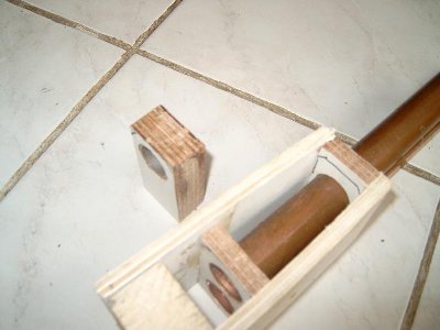 Here you see the components.<br />Both barrel and mag tube have acces to the falling block.<br /><br />Tools needed were a hole cutter, a saw, a vice and a screw driver.<br />The falling block has just one hole.<br /><br />No lever is attached, nore will I, since this assembly is too crude.Just a test.<br />Mag should be fitted with a spring and loading port.