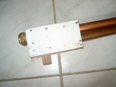 The falling block sticks out the bottom when it's fully down.Lever should be attached.