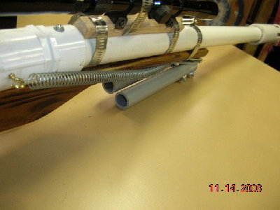 legs together and bipod folded back agenst stock, spring keeps tention on it.