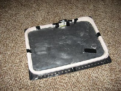 The capacitor in all its glory! lol its held together with tape.