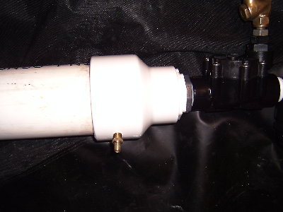 Photo 2, schrader valve mounted into the fitting.