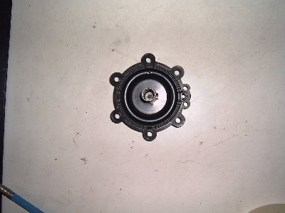 Photo 3. This is the diaphram. I have removed the white plastic piece from the equalisation hole. The equalisation hole is now about 2-2.5 millimetres in diameter.