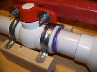 the 2&amp;quot; PVC ball valve with an extension.  The two pipe brackets take all the stress of turning the valve, versus putting stress on the joints.