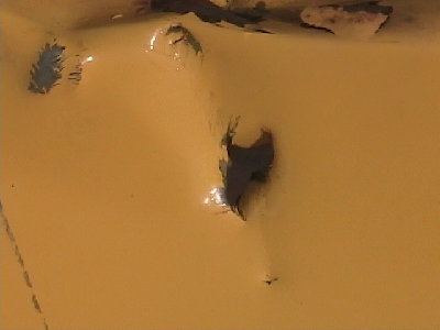 big hole in dump truck from a bolt i made