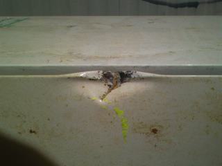 tennnis ball on fridge door at 10m