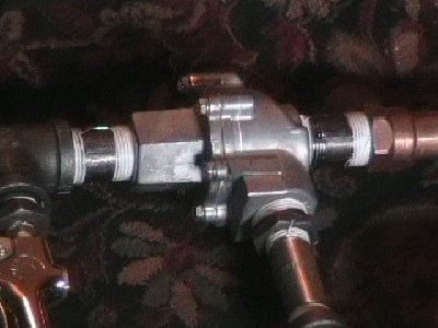 this is the qev i think it is right though cause the letters on it say in, something, and exh and i put exh (exhaust?) going to my barrel and the in to my blowgun