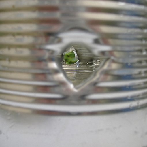 entry/exit holes in coffee tin