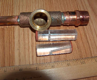 Close up of the valve.  This is where all the action happens :).  The shorter of the two pistons used to have neoprene on the front, but my epoxy gave way and it popped of.  I like super glue better, it holds the neoprene the best.