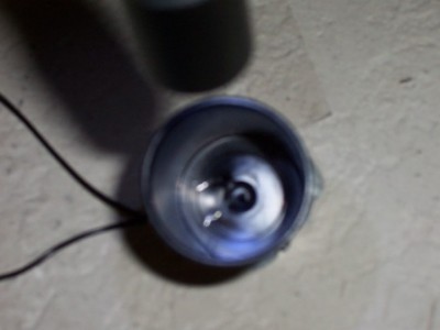 100_0918.JPG (24.01 KiB) Viewed 3404 times Ignition wires. I made a hole in the bottom of the film container to slip the wires in then covered the bottom with duct tape.