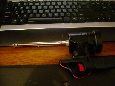 Sleek design and color. Notice bit of hot glue on the barrel near chamber. That is holding in the paper clip.