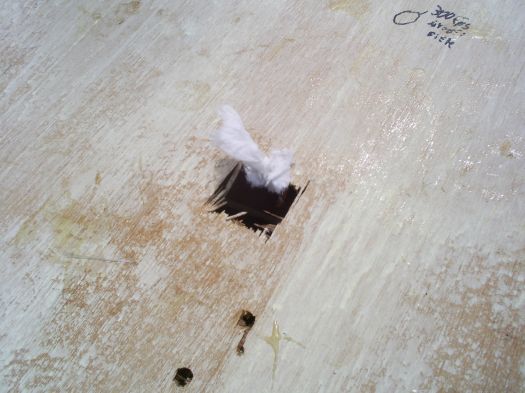 Damage to 1/8&amp;quot; plywood from 20 airsoft BBs at 80 psi.