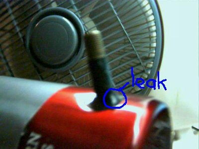 The schrader is connected into the bottle with epoxy..which dried up and didnt stick.