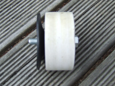 The piston is completely homemade. Made out of two sheets of (don't know exactly what its called but its like plastic MDF/fiberboard, lightweight and easy to cut) stuck together and turned to the right size on a homemade lathe with a file. Homemade lathe is an electric hand drill held in a vice, works good as. The sealing material is some rubber cut from a truck tire inner tube. Theres a bolt through the middle to hold it all together. Lubricated with synthetic grease. It hasnt broken and seals well around the barrel