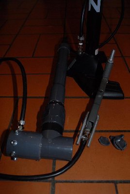 Hooked to a test chamber, it makes a mini gun of its own. I just had to try that, so I plugged a 80 cm 32 mm pipe in the exit port, and put a spare end cap in a plastic bag as a projectile. I fired it at a bucket at only 2 or 3 bar. I now have no spare end cap.
