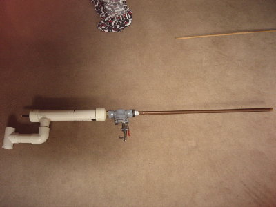 The gun in a full side view.