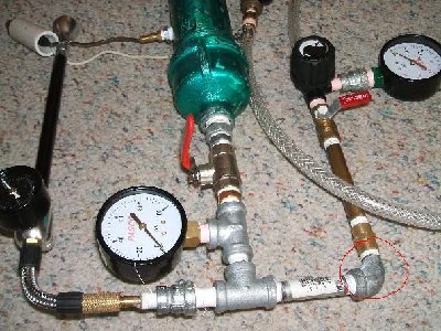 I fill from the propane meter to make sure all the propane is pushed from the meter into the chamber. SpudBlaster does the same thing.<br />Pay no attention to the red circle.