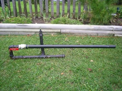 The whole gun, with the 4' barrel attached. The vertical part is a handle, and the fill valve is at the top of the handle.