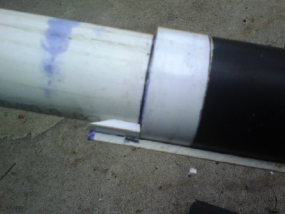 This is the receiver holding the shell.  The shell is made of a piece of pipe (same size as barrel).  A piece of coupling is cut (in the case, 1&amp;quot; wide) and glued about an inch from the end.