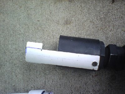 This is the receiver with the locking mechanism shown.  The locking mechanism is constructed using a cutout piece of pipe.  A piece of the coupling used for the shell was then glued on the end, as shown.