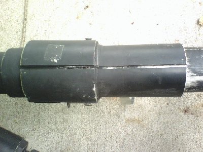 To allow the barrel to slide smoothly, the tee was hollowed out, the 2&amp;quot; coupling was secured to it and the whole thing (coupling and tee) was slit.  It slides good.