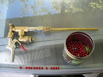 The 8mm ammo. They are beads that I got from a discount store. They are Xmas decorations. I got the chain for 99c. Had about 300+ beads on it. All 8mm exactly and fly dead straight.