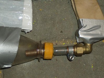 The air fittings to the coke bottle. I made a smaller hole in the cap then that of the tube. U push the tube in and then insert a bit bigger pip at the back of the cap. This fitting is self sealing as the higher the pressure the more force outwards&amp;gt;tighter fit.